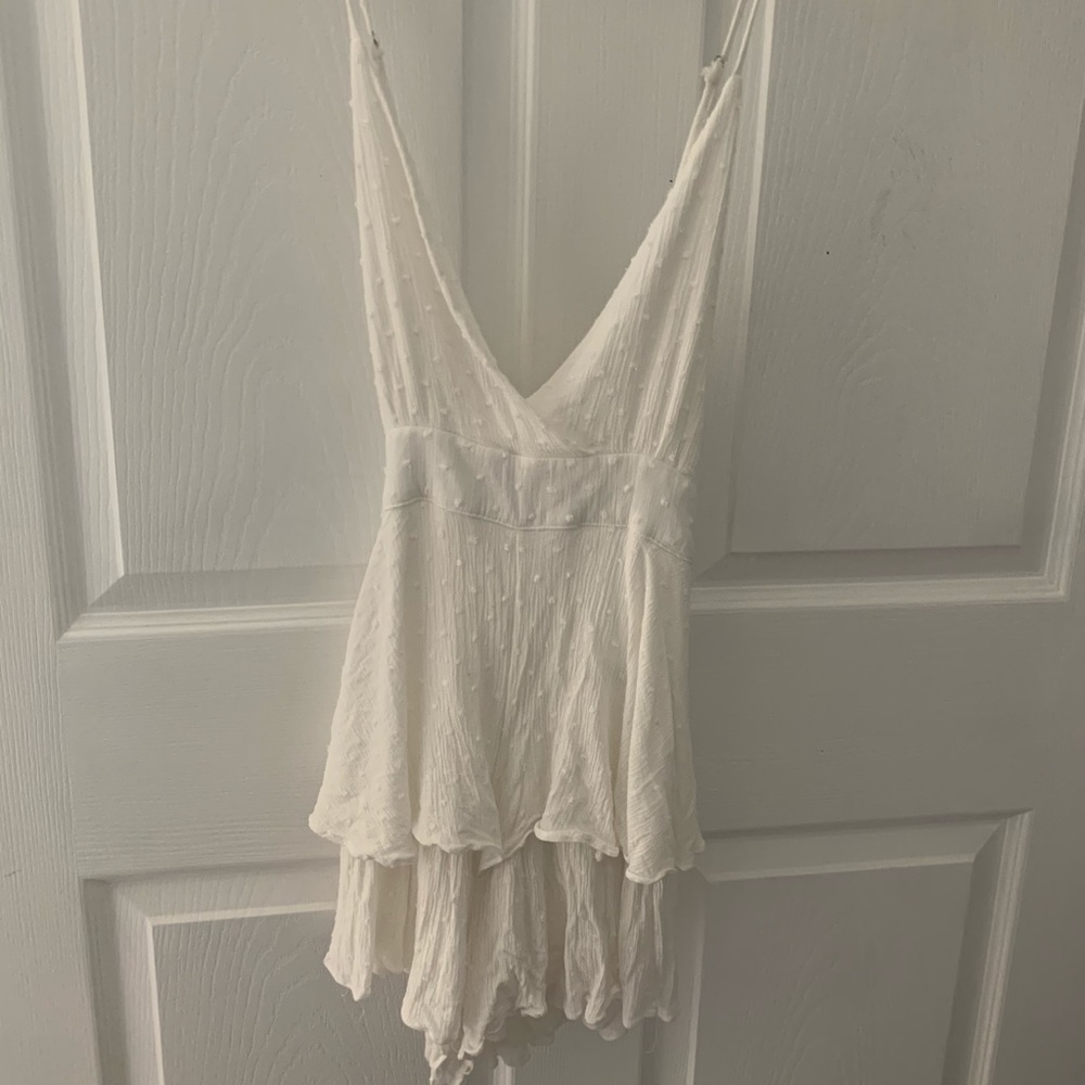 White romper with tie back and adjustable straps